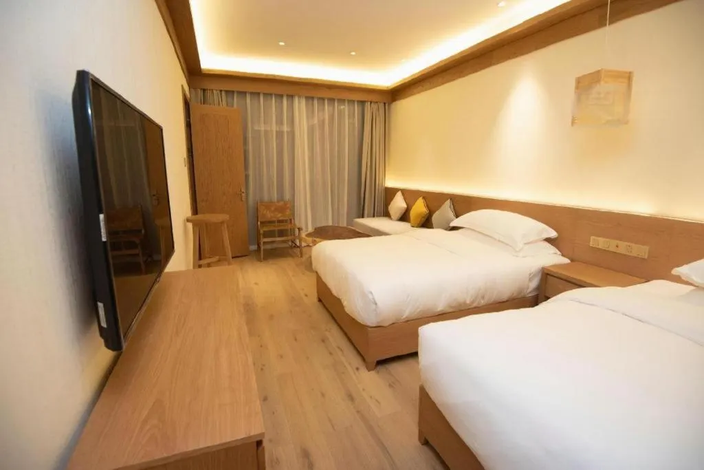 Bed in Ramada by Wyndham Guergou