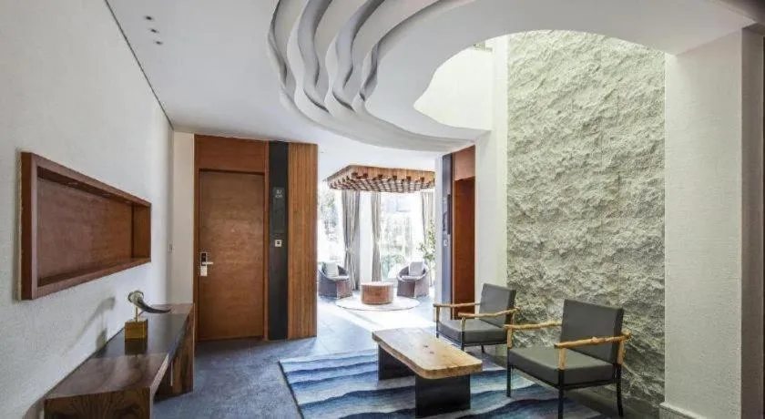 Bed in Ramada by Wyndham Guergou