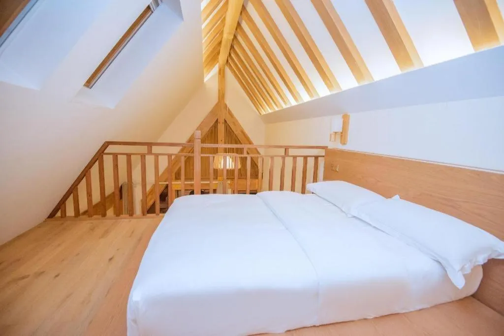 Bed in Ramada by Wyndham Guergou