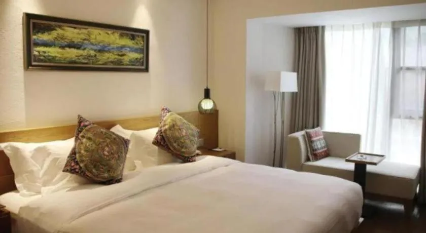 Bed in Ramada by Wyndham Guergou