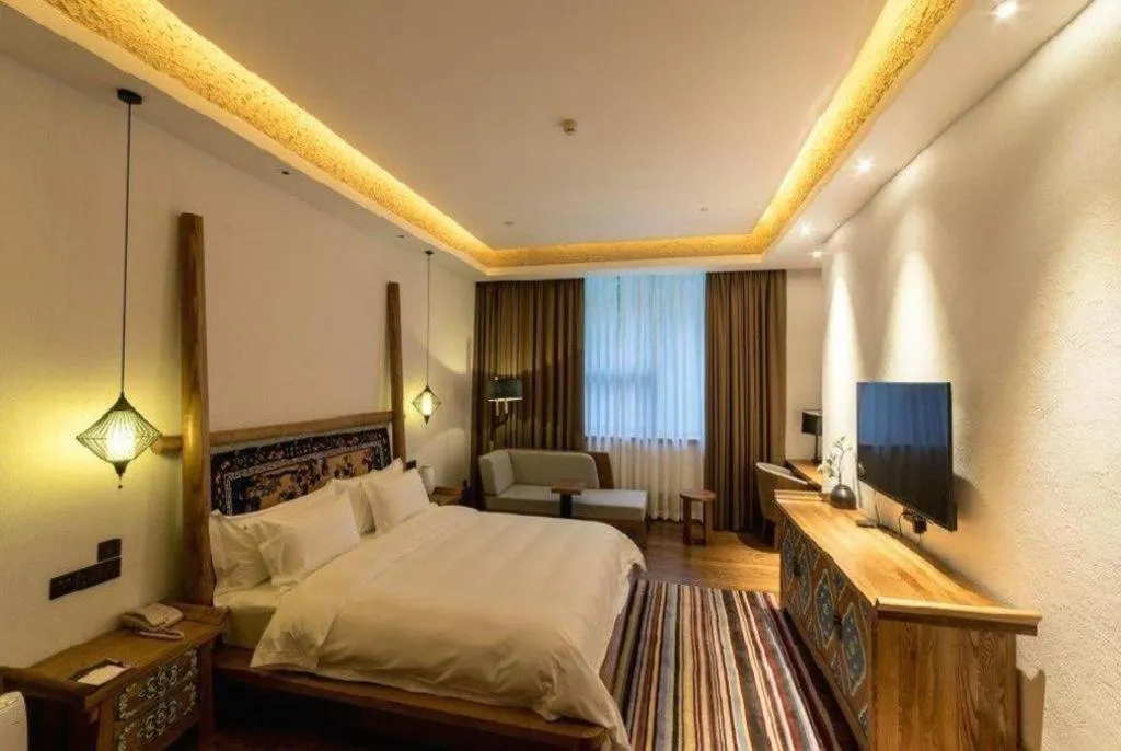 Bed in Ramada by Wyndham Guergou