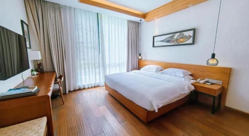 Bed in Ramada by Wyndham Guergou