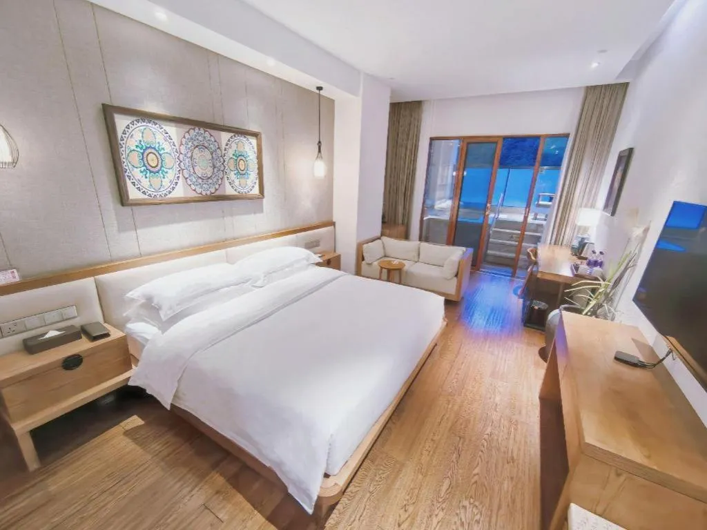 Bed in Ramada by Wyndham Guergou