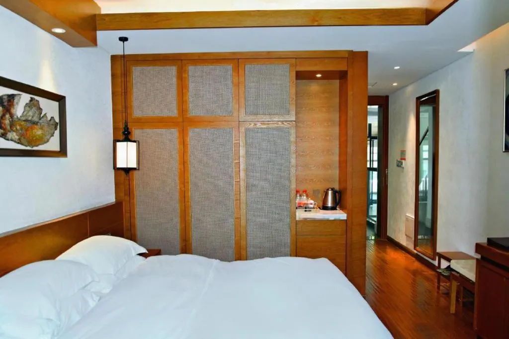 Bed in Ramada by Wyndham Guergou