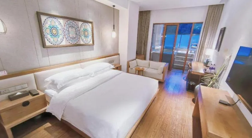 Bed in Ramada by Wyndham Guergou