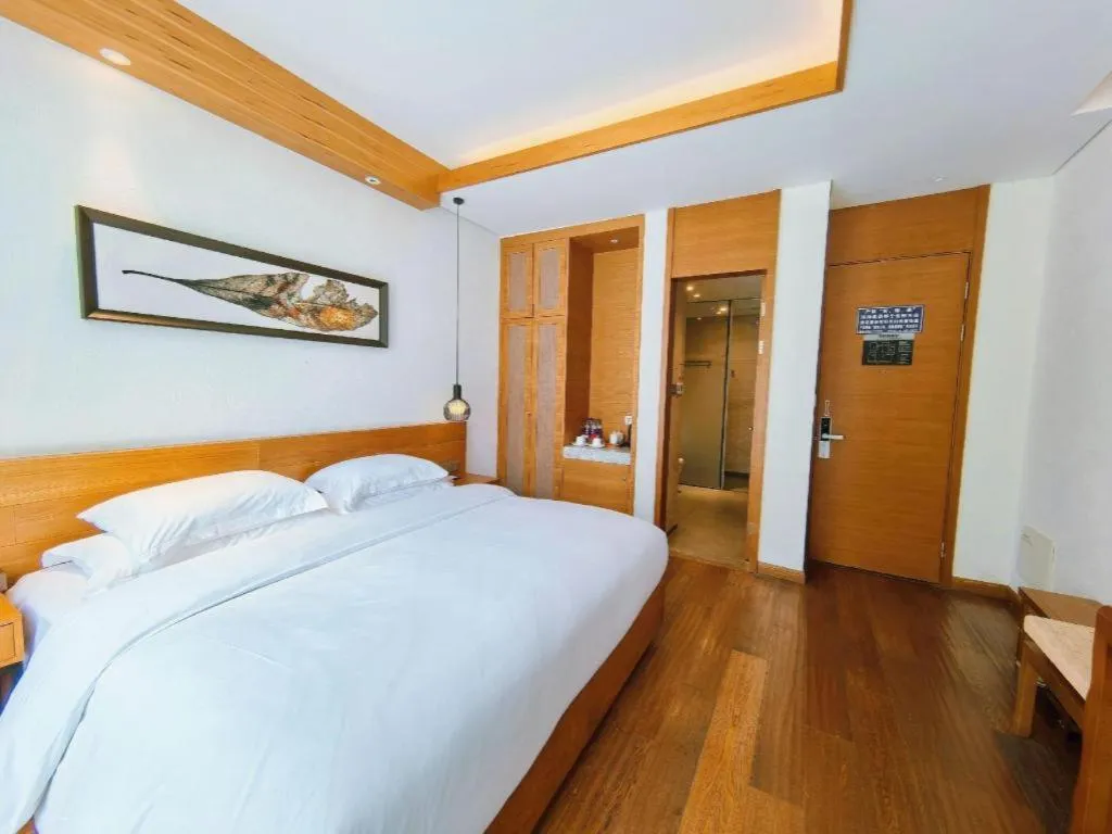 Bed in Ramada by Wyndham Guergou