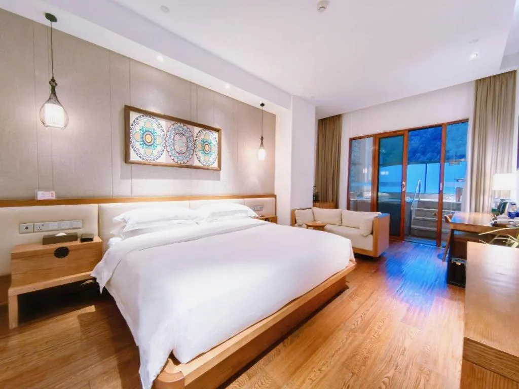 Bed in Ramada by Wyndham Guergou