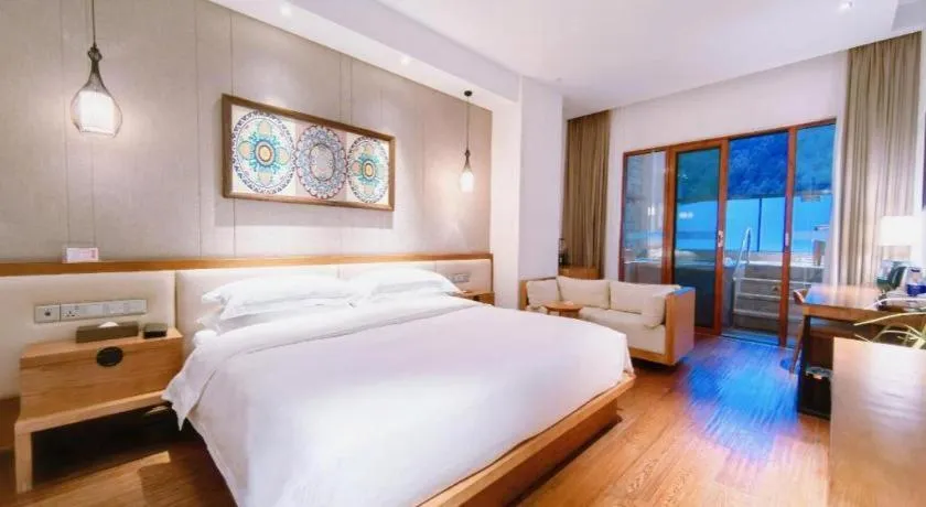 Bed in Ramada by Wyndham Guergou