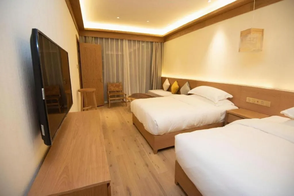 Bed in Ramada by Wyndham Guergou