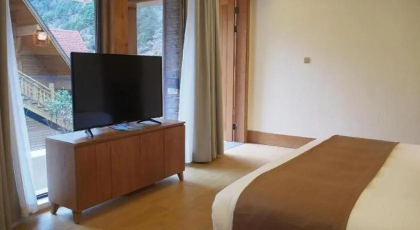 Bed in Ramada by Wyndham Guergou