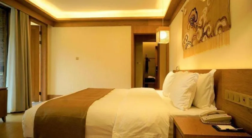 Bed in Ramada by Wyndham Guergou