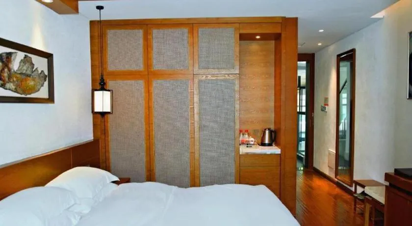 Bed in Ramada by Wyndham Guergou