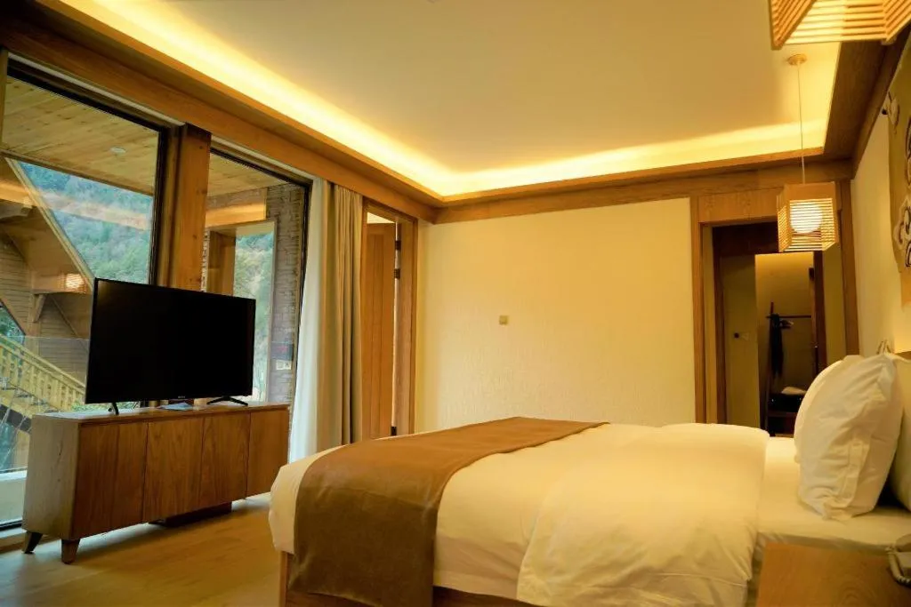 Bed in Ramada by Wyndham Guergou