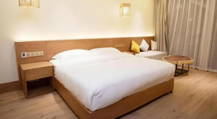 Bed in Ramada by Wyndham Guergou