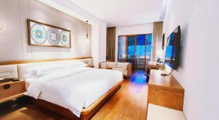 Bed in Ramada by Wyndham Guergou