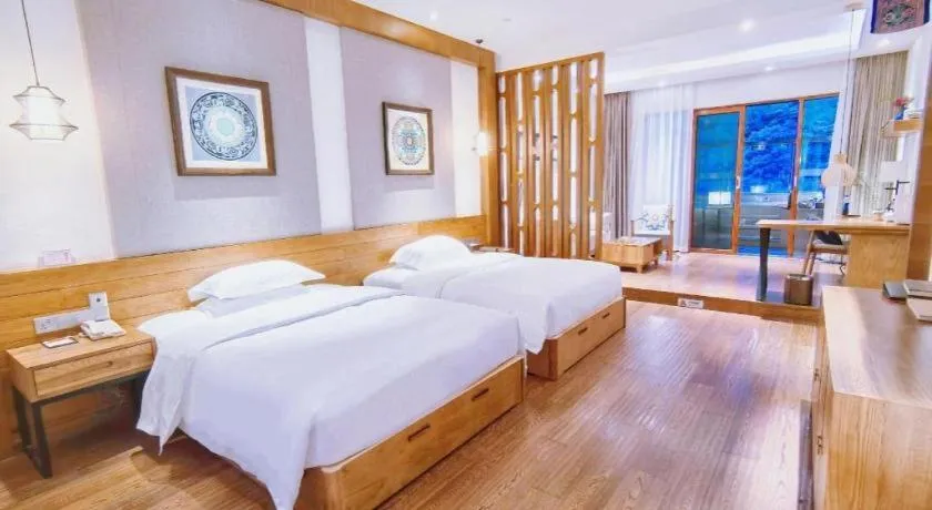 Bed in Ramada by Wyndham Guergou