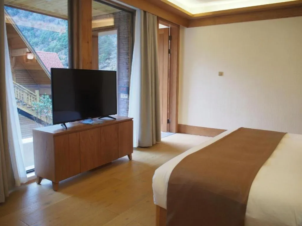 Bed in Ramada by Wyndham Guergou