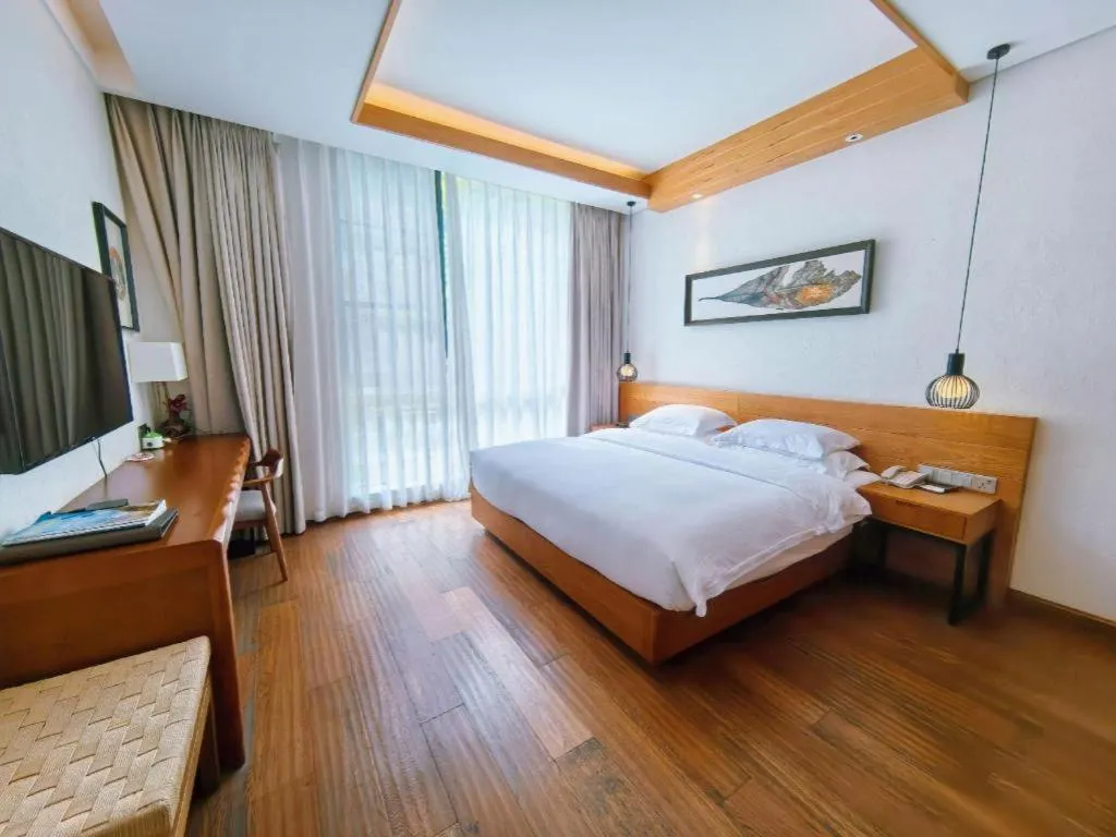 Bed in Ramada by Wyndham Guergou