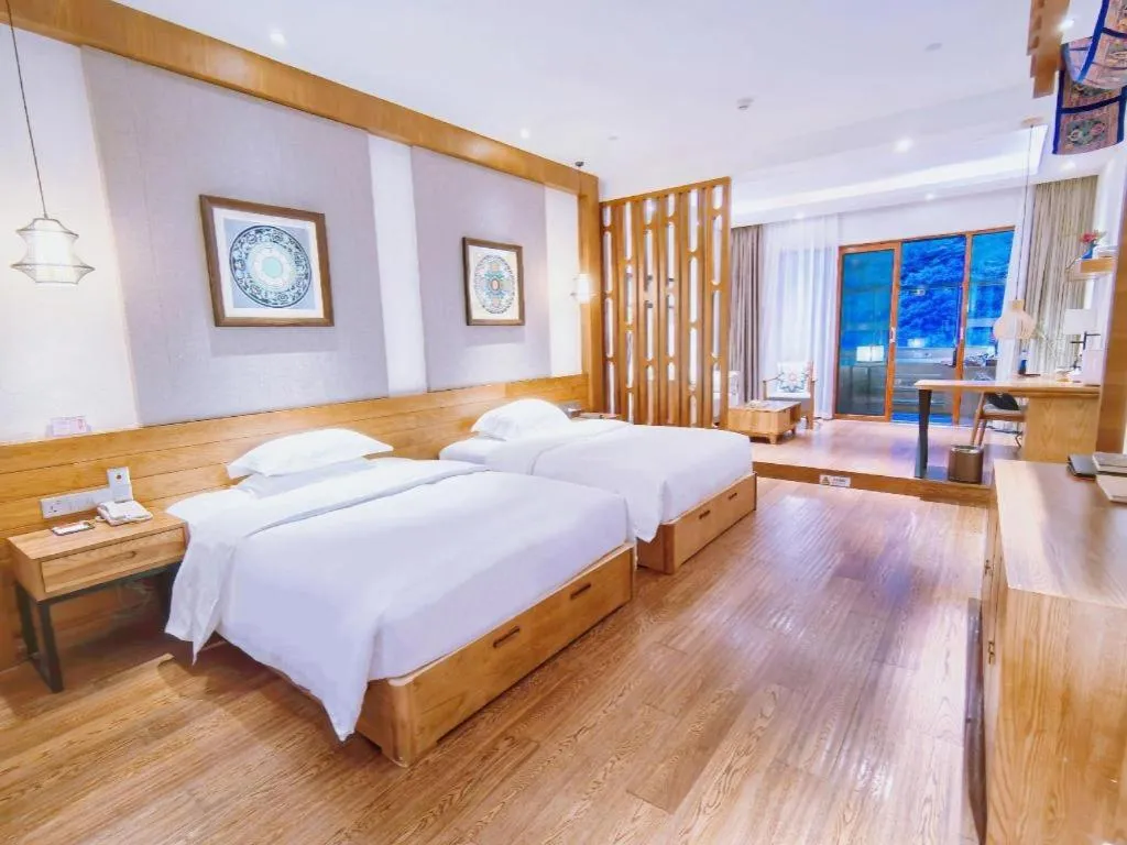 Bed in Ramada by Wyndham Guergou