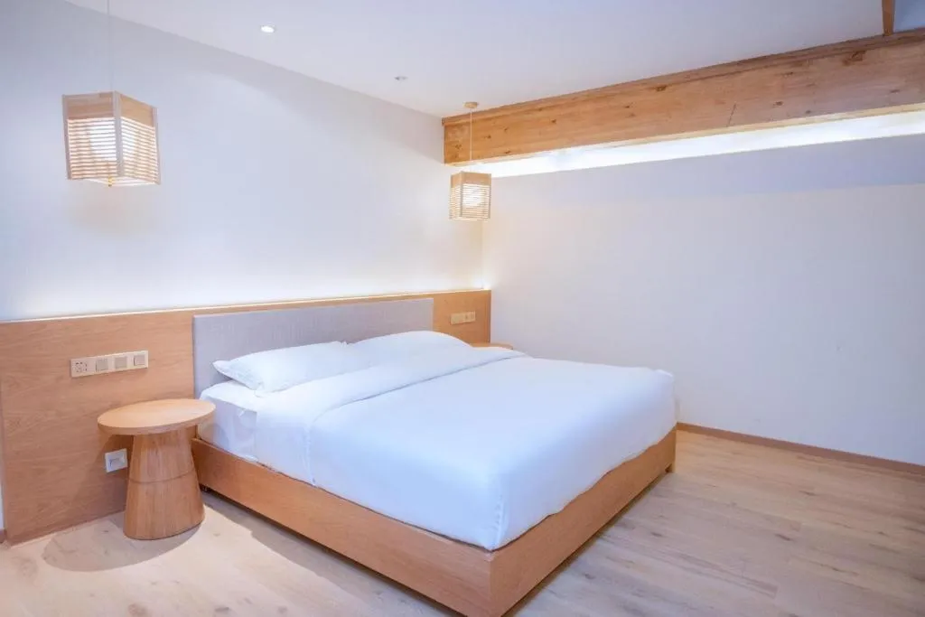 Bed in Ramada by Wyndham Guergou