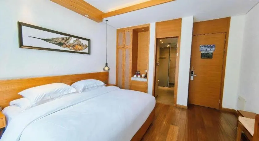 Bed in Ramada by Wyndham Guergou