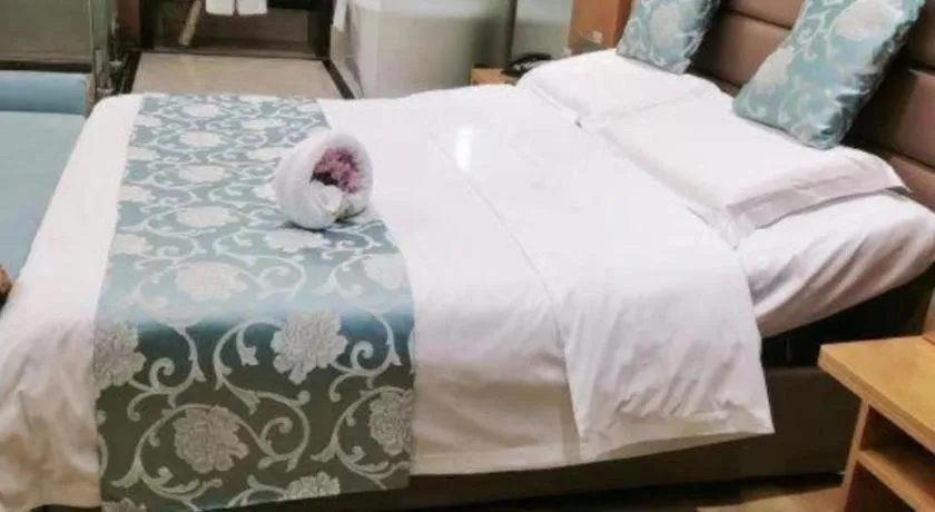 Bed in Ramada by Wyndham Taixing