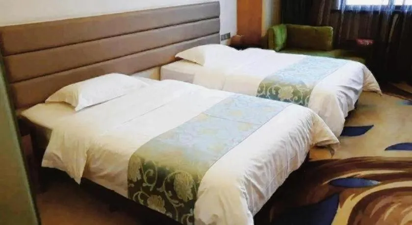 Bed in Ramada by Wyndham Taixing