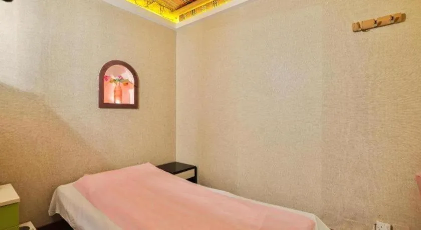 Bed in OYO 482 Sun And Sands Downtown