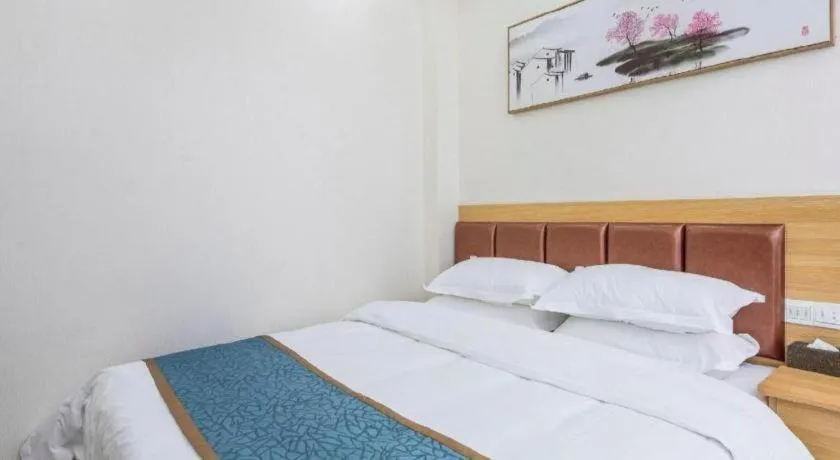 Bed in Guilin Wanjing Hotel