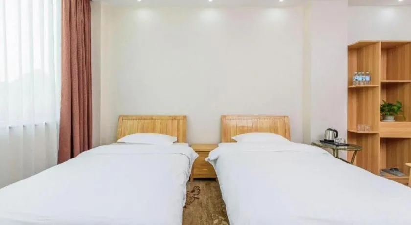Bed in Guilin Wanjing Hotel