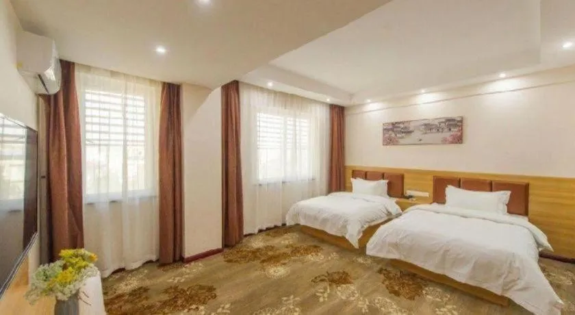 Bed in Guilin Wanjing Hotel