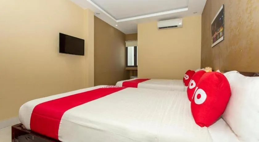 Bed in OYO 1067 Phuc Long Hotel