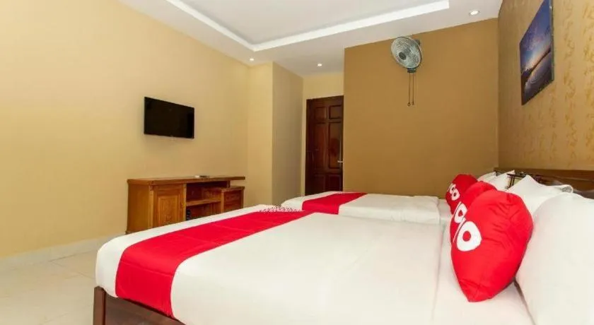 Bed in OYO 1067 Phuc Long Hotel