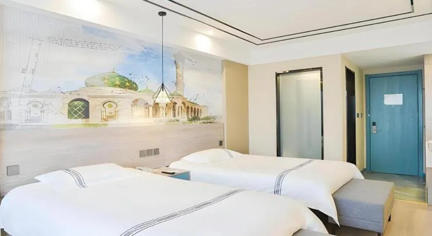 Bed in Urban Garden Hotel Chengyang District Government Liuting Airport