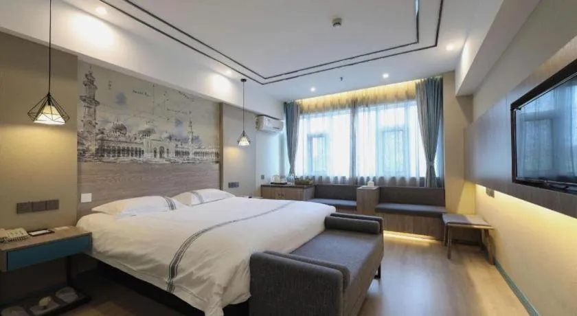 Bed in Urban Garden Hotel Chengyang District Government Liuting Airport