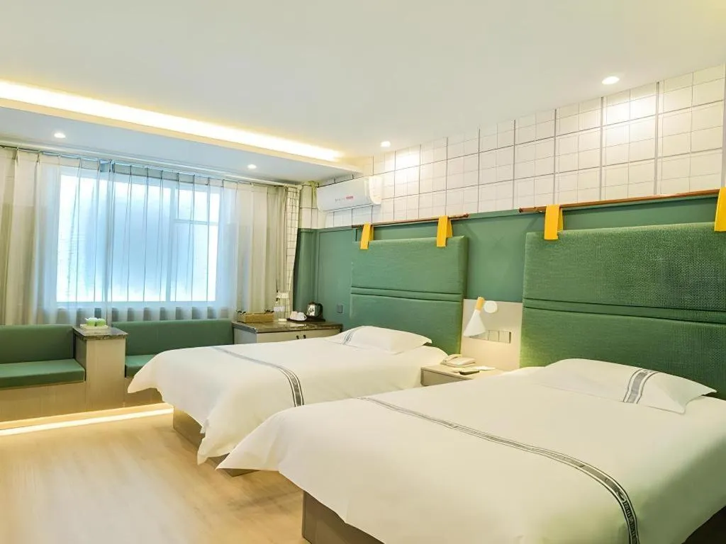 Bed in Urban Garden Hotel Chengyang District Government Liuting Airport