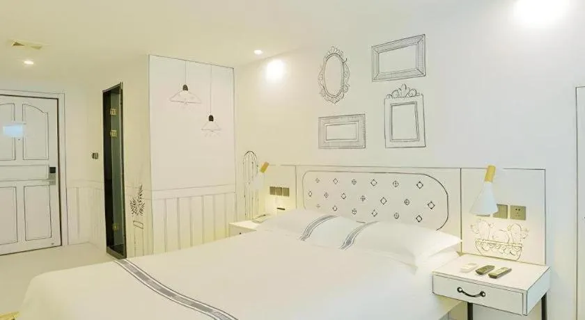 Bed in Urban Garden Hotel Chengyang District Government Liuting Airport