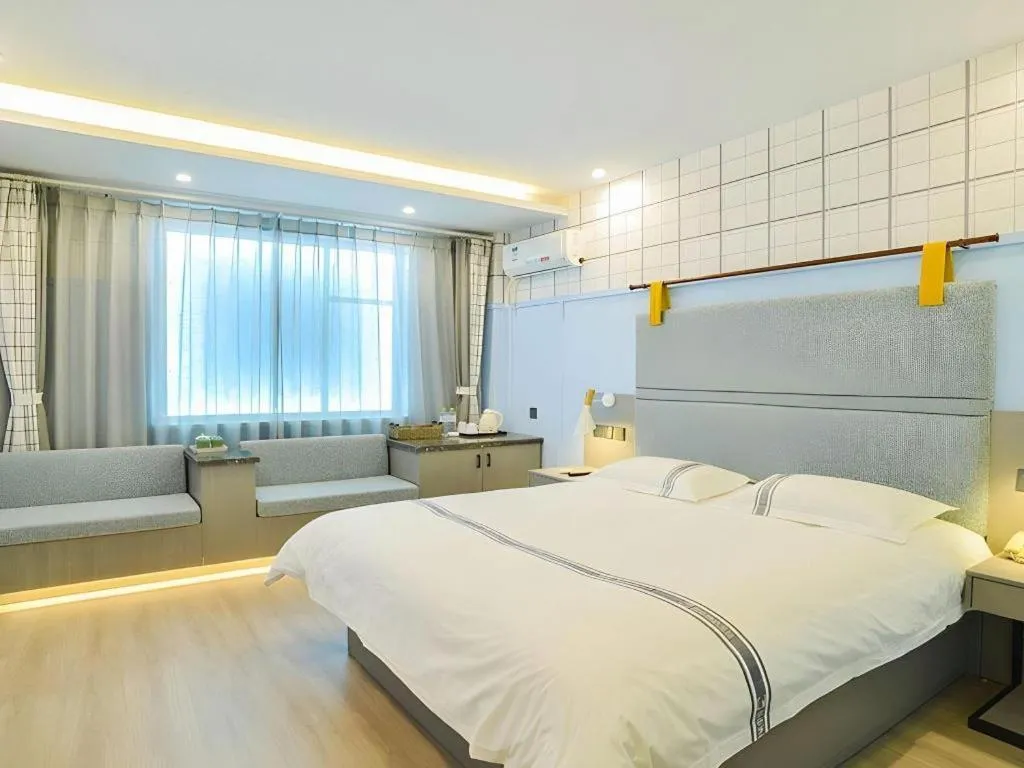 Bed in Urban Garden Hotel Chengyang District Government Liuting Airport