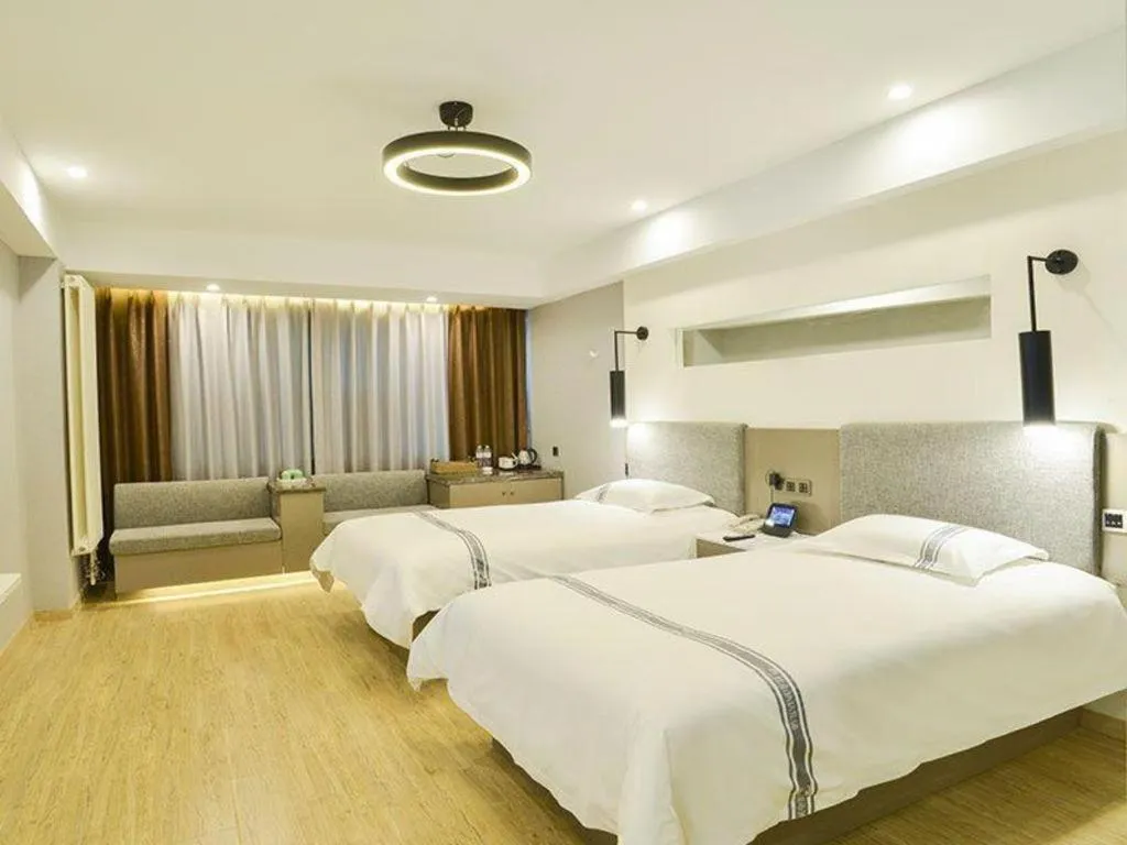 Bed in Urban Garden Hotel Chengyang District Government Liuting Airport