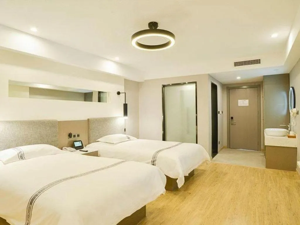 Bed in Urban Garden Hotel Chengyang District Government Liuting Airport