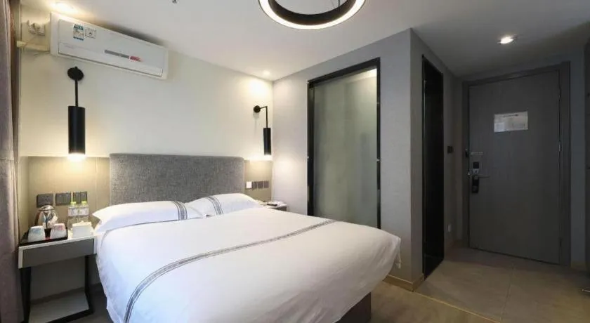 Bed in Urban Garden Hotel Chengyang District Government Liuting Airport