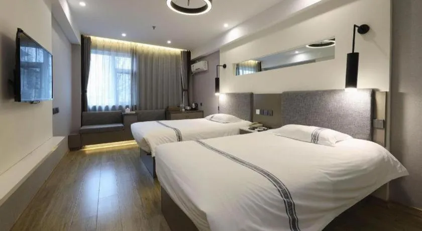 Bed in Urban Garden Hotel Chengyang District Government Liuting Airport