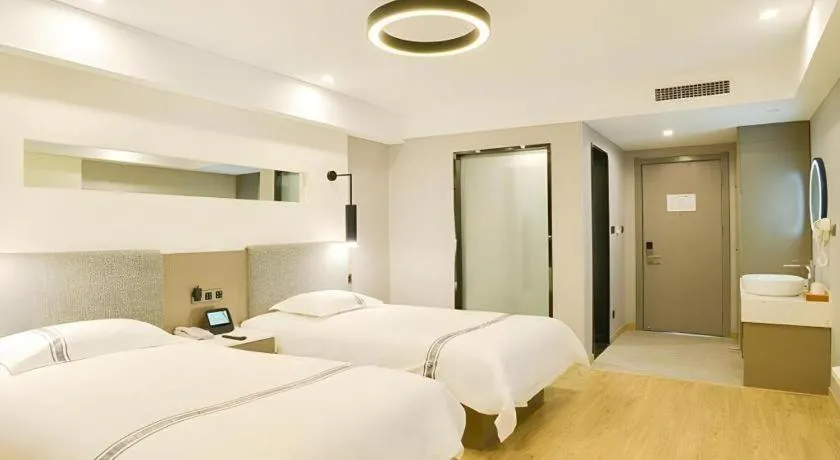 Bed in Urban Garden Hotel Chengyang District Government Liuting Airport