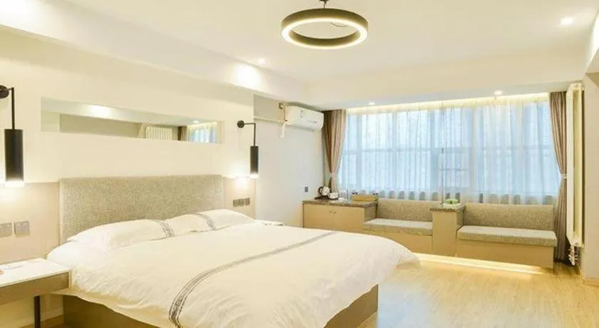 Bed in Urban Garden Hotel Chengyang District Government Liuting Airport