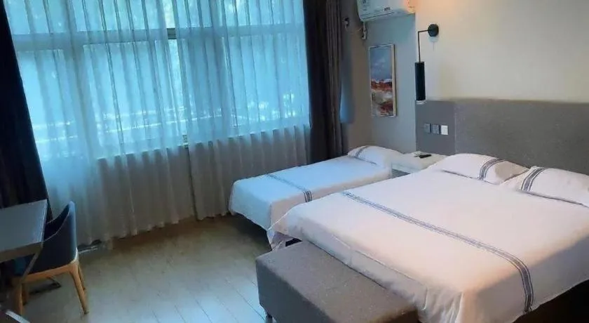 Bed in Urban Garden Hotel Chengyang District Government Liuting Airport