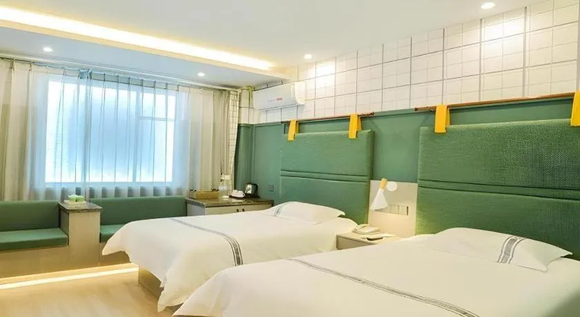 Bed in Urban Garden Hotel Chengyang District Government Liuting Airport