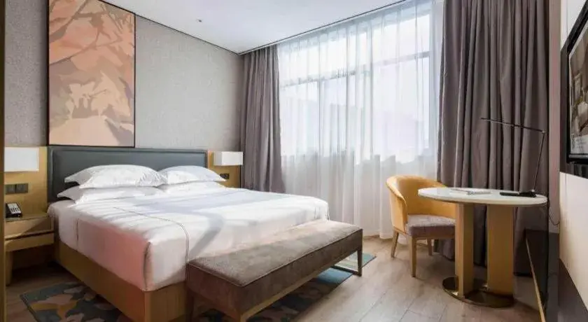 Bed in The Hotel V Nanjing Lishui Bed in The Hotel V Nanjing Lishui