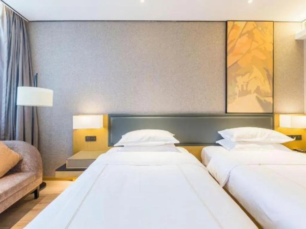 Bed in The Hotel V Nanjing Lishui