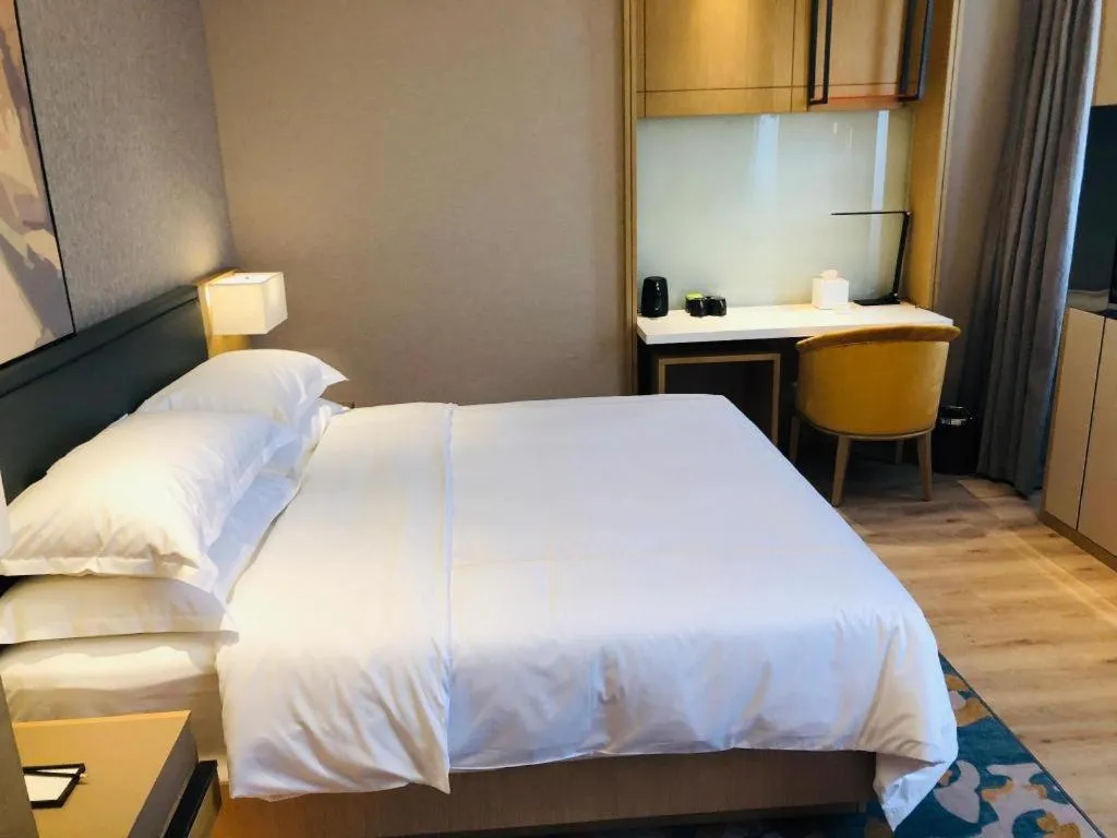 Bed in The Hotel V Nanjing Lishui