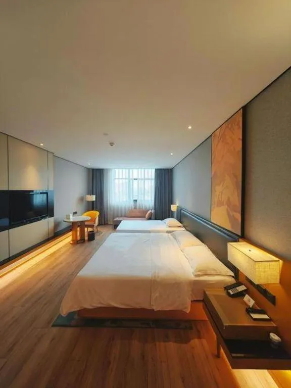 Bed in The Hotel V Nanjing Lishui